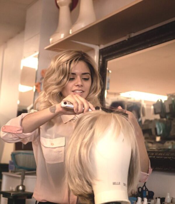 women styling a wig